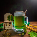 Glass of green beer and shamrock for St. Patrick's Day